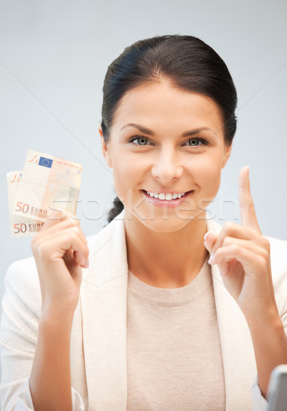 Stockfoto: Vrouw · euro · cash · geld · foto · business