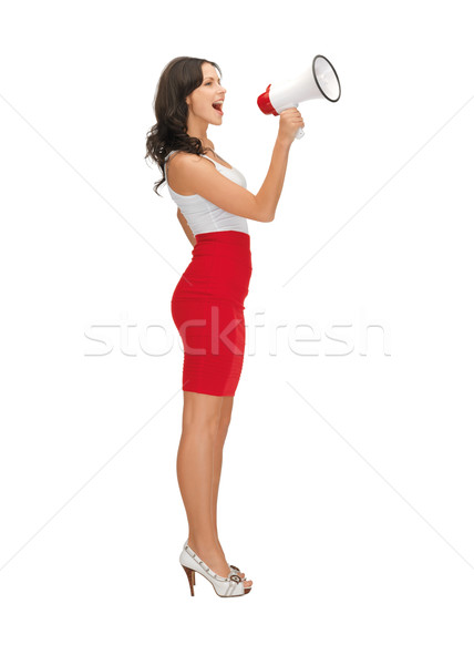 Stock photo: woman in a dress with megaphone