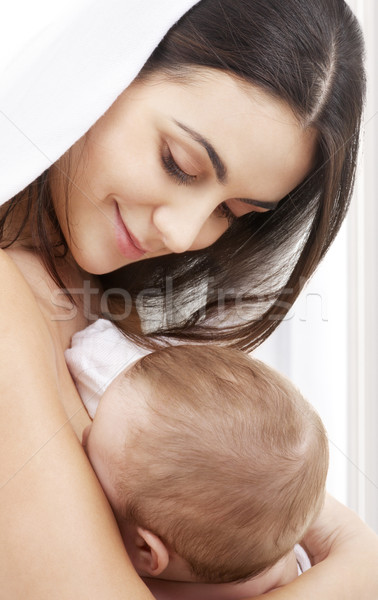 happy mother with baby at home Stock photo © dolgachov