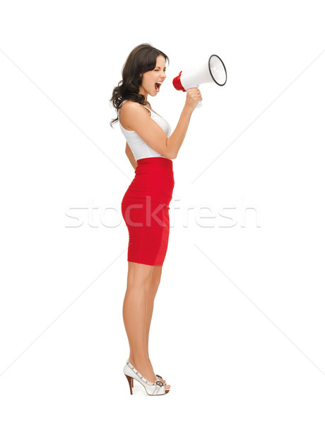 strict woman shouting in megaphone Stock photo © dolgachov