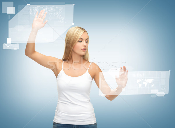 woman working with virtual screen Stock photo © dolgachov