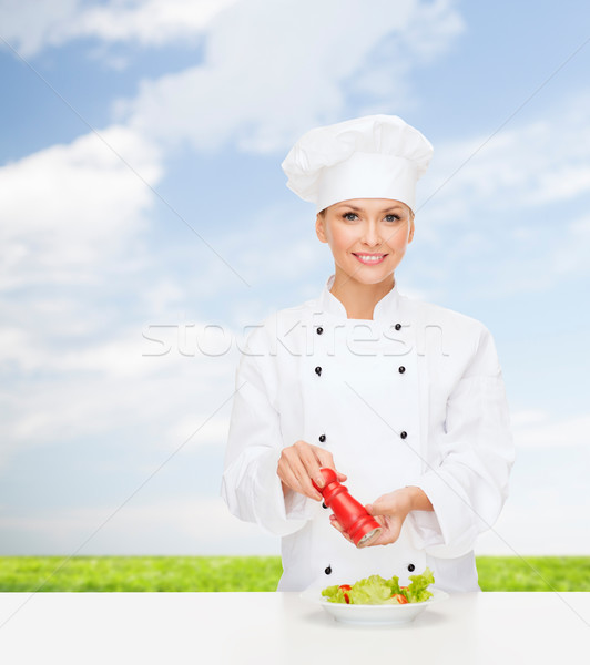 Mosolyog női szakács saláta főzés étel Stock fotó © dolgachov