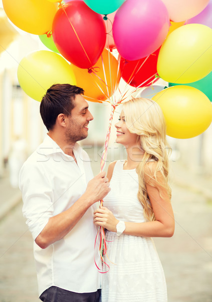 Pareja colorido globos verano vacaciones celebración Foto stock © dolgachov