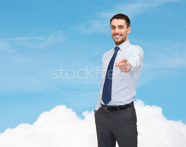 Stock photo: handsome businessman pointing finger at you