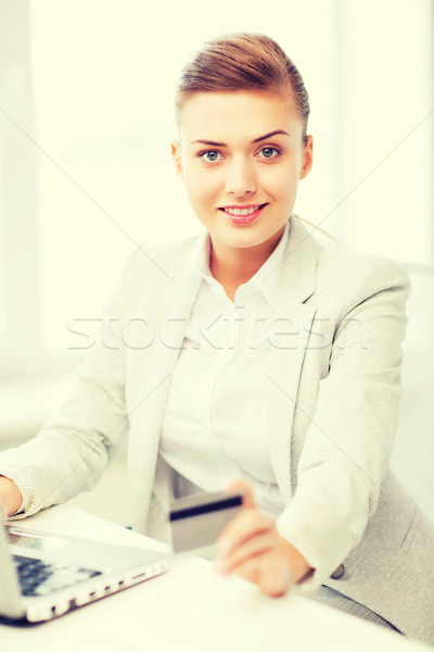businesswoman with laptop using credit card Stock photo © dolgachov