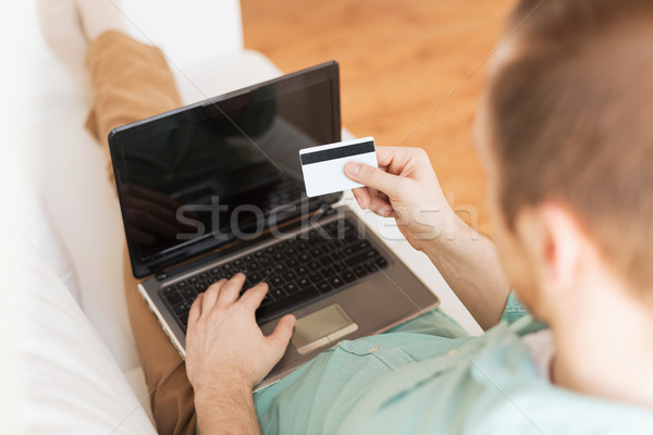 close up of man with laptop and credit card Stock photo © dolgachov