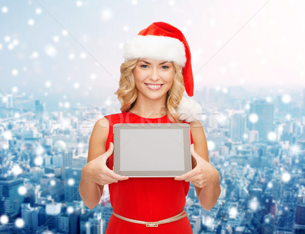 Stock photo: woman in santa helper hat with tablet pc
