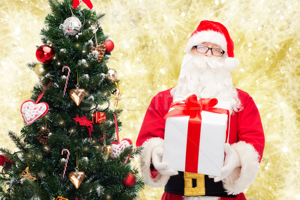 Man kostuum kerstman geschenkdoos christmas vakantie Stockfoto © dolgachov