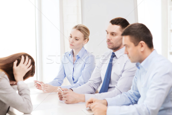 businesswoman getting fired in office Stock photo © dolgachov