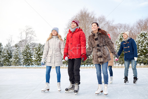 Stok fotoğraf: Mutlu · arkadaşlar · buz · pateni · açık · havada · insanlar