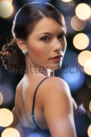 beautiful young woman sitting in bath towel Stock photo © dolgachov