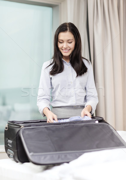 Femme d'affaires choses valise affaires technologie [[stock_photo]] © dolgachov