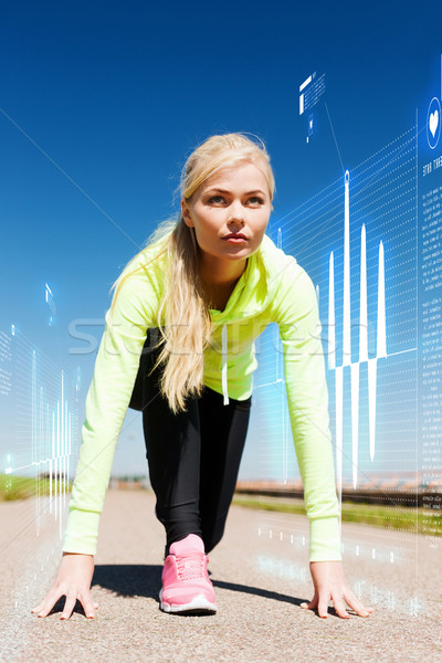 concentrated woman doing running outdoors Stock photo © dolgachov