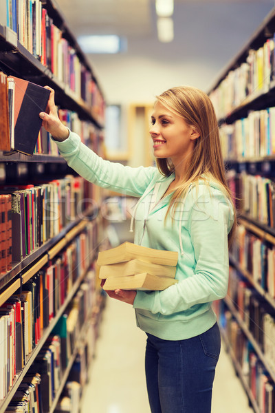 счастливым студент девушки женщину книга библиотека Сток-фото © dolgachov