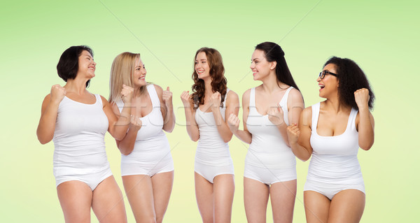 Stock photo: group of happy different women celebrating victory