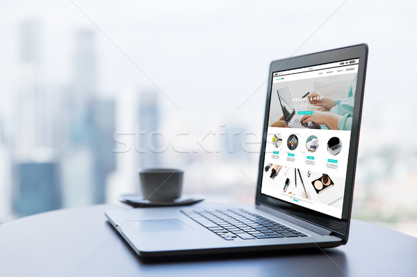 close up of laptop computer with online shop page Stock photo © dolgachov