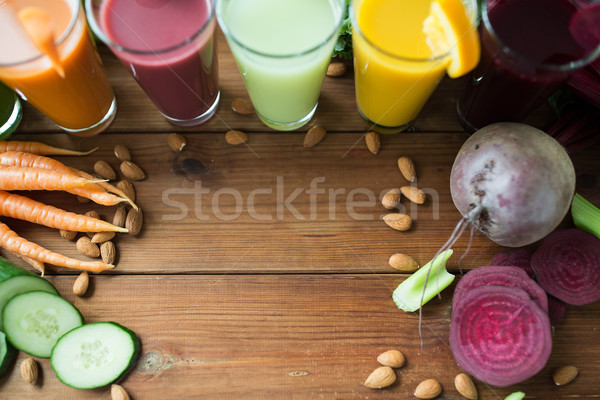 glasses with different fruit or vegetable juices Stock photo © dolgachov