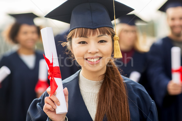 Fericit student burlac diplomă educaţie Imagine de stoc © dolgachov