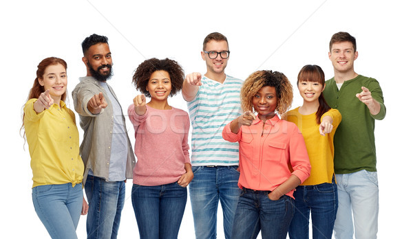 Internationaux groupe de gens pointant diversité course Photo stock © dolgachov