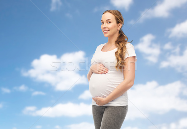 Stockfoto: Gelukkig · zwangere · vrouw · aanraken · buik · hemel · zwangerschap