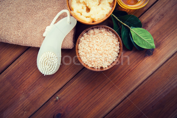 close up of himalayan salt with brush and towel Stock photo © dolgachov