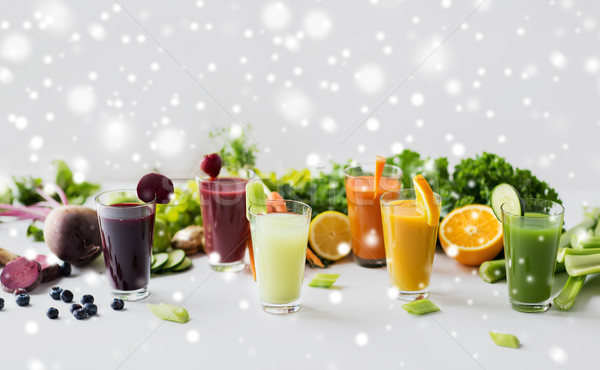 Stock photo: glasses with different fruit or vegetable juices