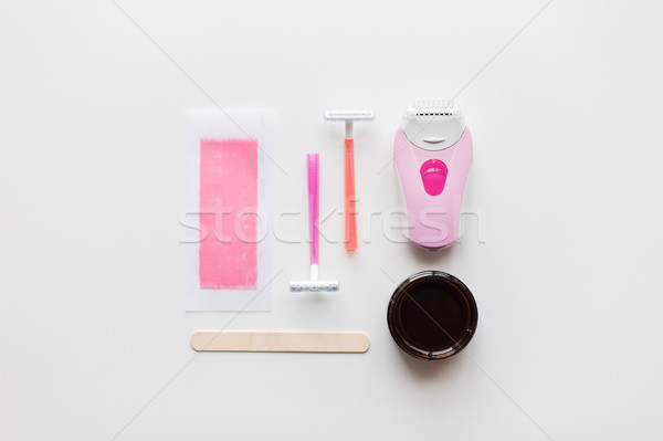 hair removal wax, epilator and safety razor Stock photo © dolgachov