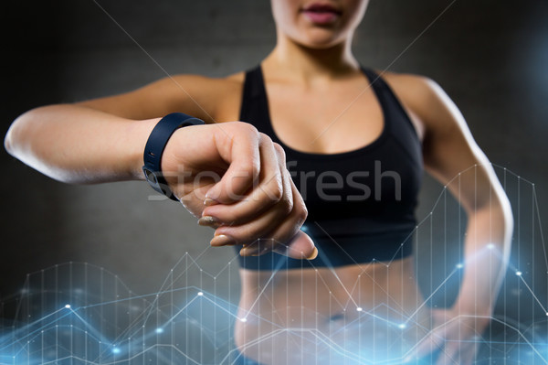 Nő óra tornaterem sport fitnessz technológia Stock fotó © dolgachov