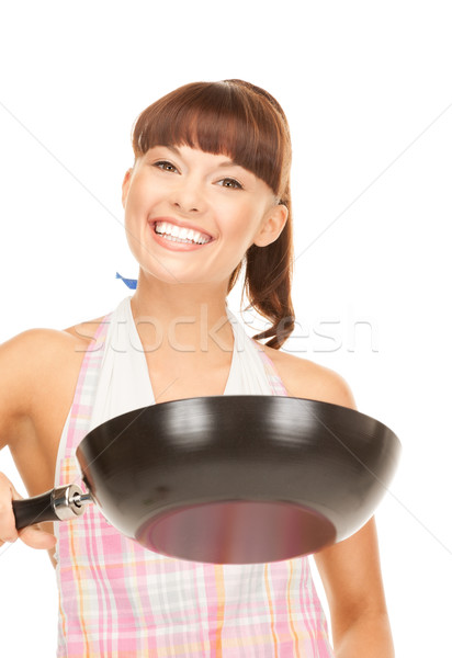 housewife with frying pan Stock photo © dolgachov