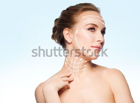 Donna indossare lucido diamante orecchini primo piano Foto d'archivio © dolgachov