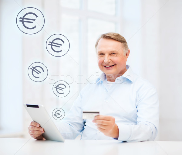 Oude man creditcard home business online Stockfoto © dolgachov