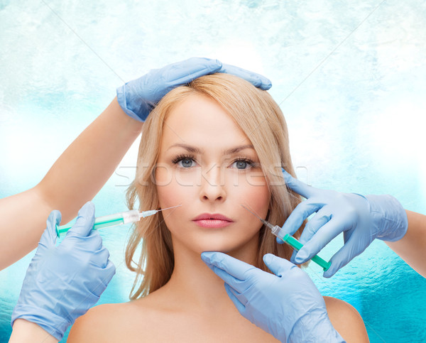 Vrouw gezicht handen schoonheid cosmetische chirurgie vrouw water Stockfoto © dolgachov