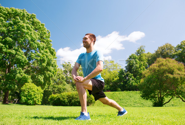 Souriant homme extérieur fitness sport [[stock_photo]] © dolgachov