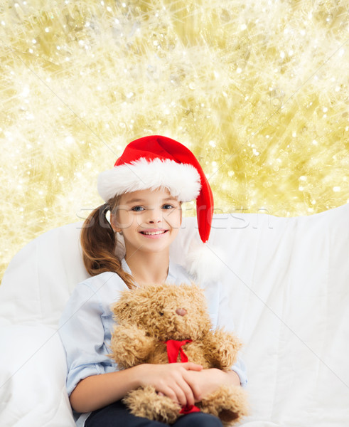 smiling little girl with teddy bear Stock photo © dolgachov