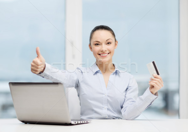 Stock photo: businesswoman with laptop in office