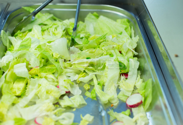 close up of romaine lettuce salad in container Stock photo © dolgachov