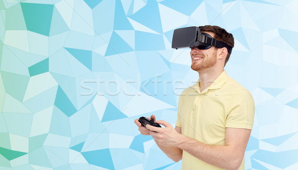 Gelukkig man virtueel realiteit hoofdtelefoon gamepad Stockfoto © dolgachov