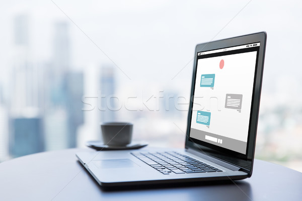 Laptop filiżankę kawy biuro tabeli technologii Zdjęcia stock © dolgachov
