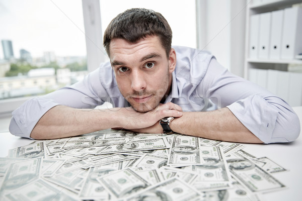 счастливым бизнесмен куча деньги служба деловые люди Сток-фото © dolgachov