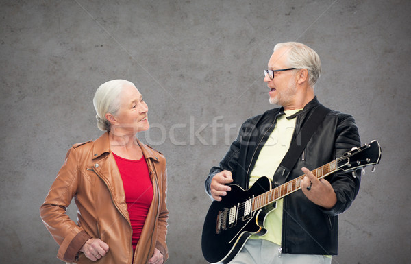 [[stock_photo]]: Heureux · couple · de · personnes · âgées · guitare · électrique · musique · âge · personnes