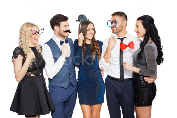 happy friends with party props posing Stock photo © dolgachov