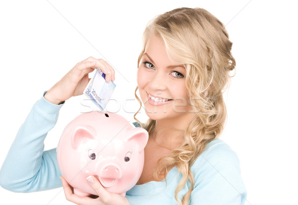 Mujer alcancía dinero Foto papel azul Foto stock © dolgachov