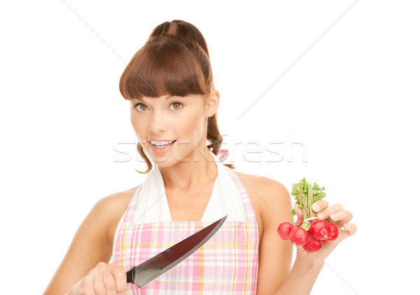 housewife with big knife and radish Stock photo © dolgachov