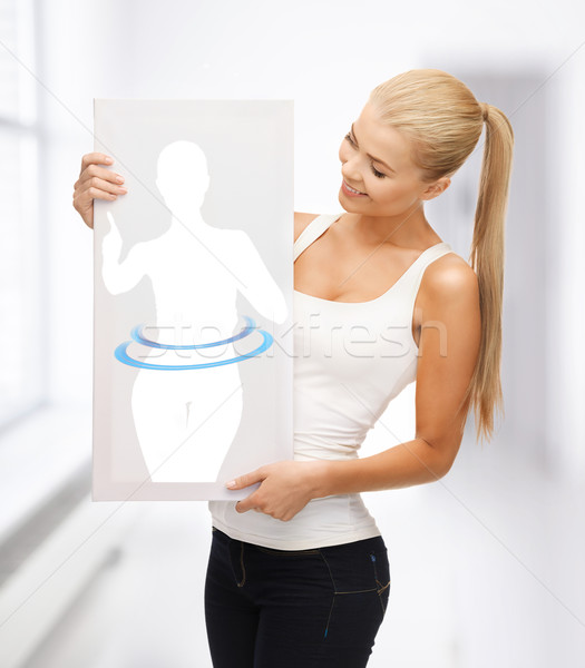 woman holding picture of dieting woman Stock photo © dolgachov
