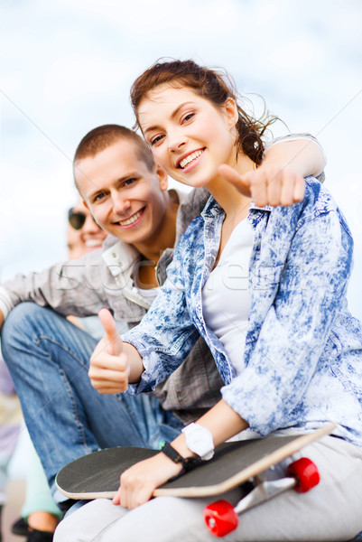 teenages with skateboard outside Stock photo © dolgachov