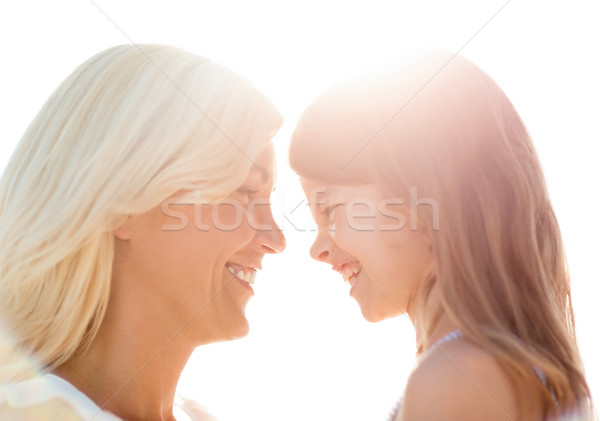 happy mother and child girl Stock photo © dolgachov