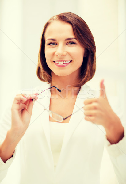 businesswoman with eyeglasses Stock photo © dolgachov