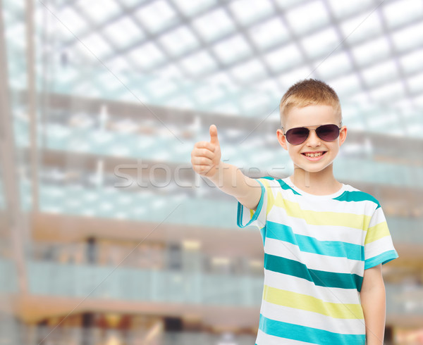 smiling cute little boy in sunglasses Stock photo © dolgachov