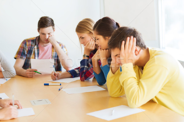 group of students with papers Stock photo © dolgachov