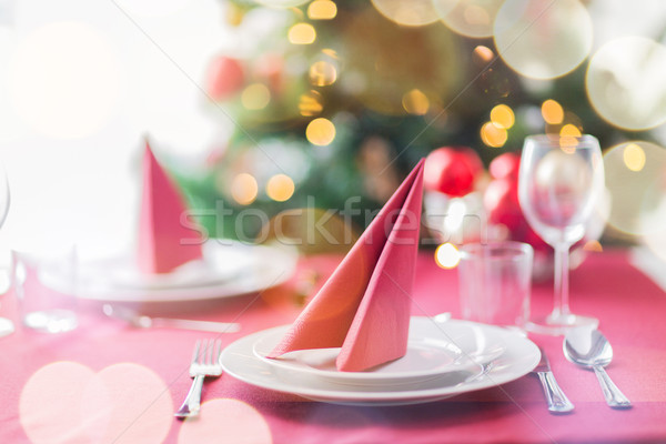 room with christmas tree and decorated table Stock photo © dolgachov